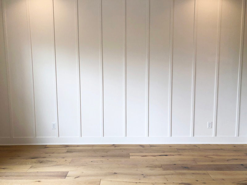 A white board and batten entryway